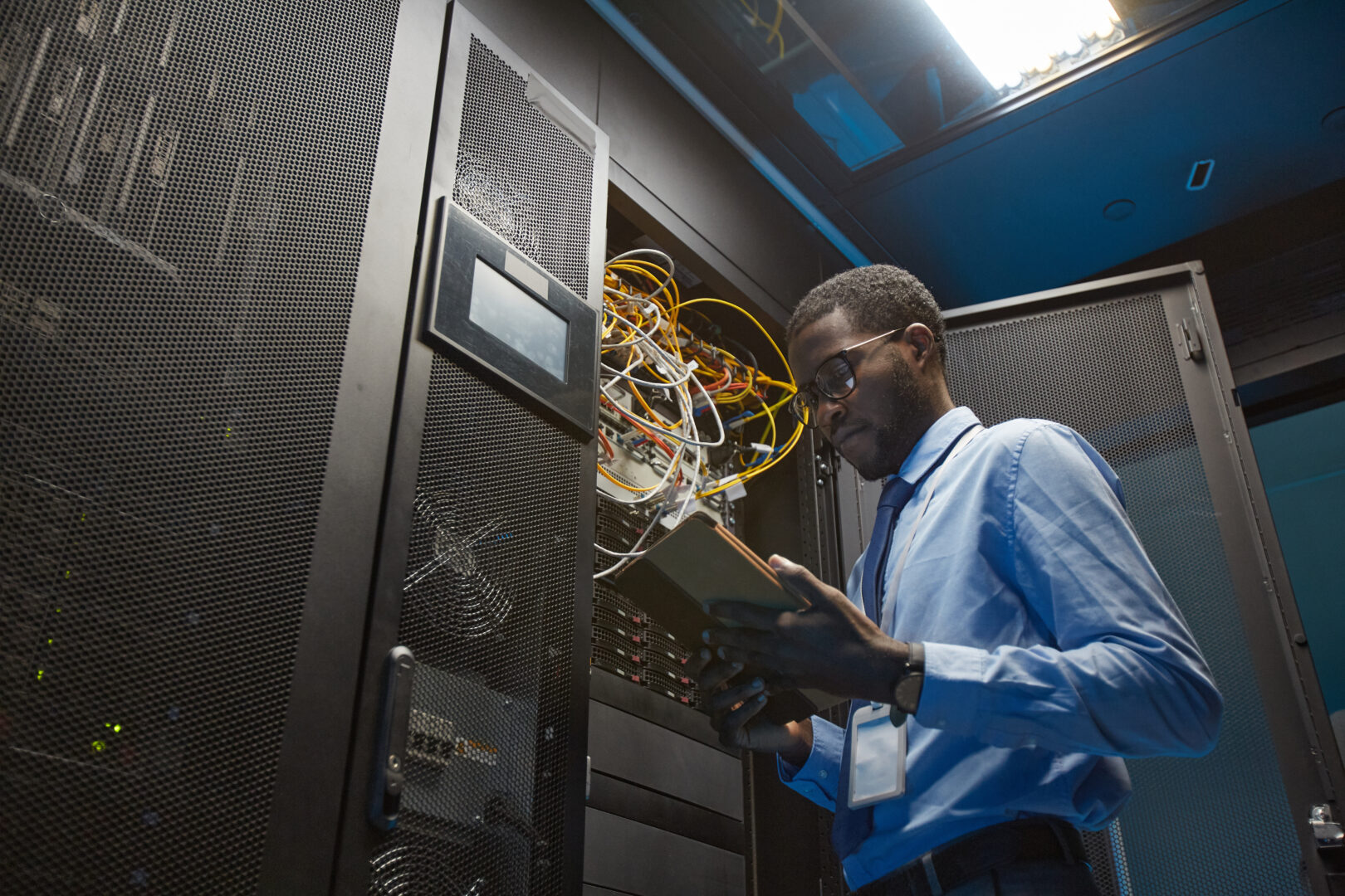 African American Network Engineer in Server Room